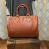 LOUIS VUITTON Speedy 25 in Epi Leather - PopRock Vintage. The cool quotes t-shirt store.