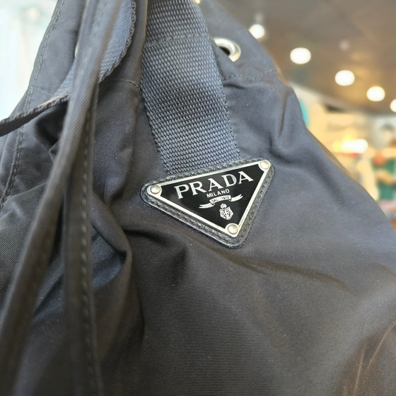 PRADA Black Nylon Drawstring Bucket Bag - PopRock Vintage. The cool quotes t-shirt store.